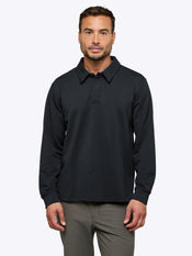 Man wearing a dark dark blue long-sleeve polo shirt on a white background